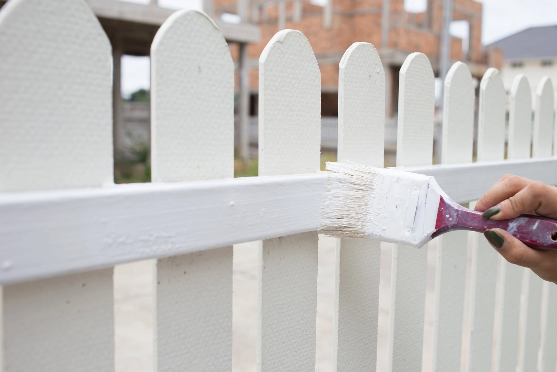 painting wooden fence