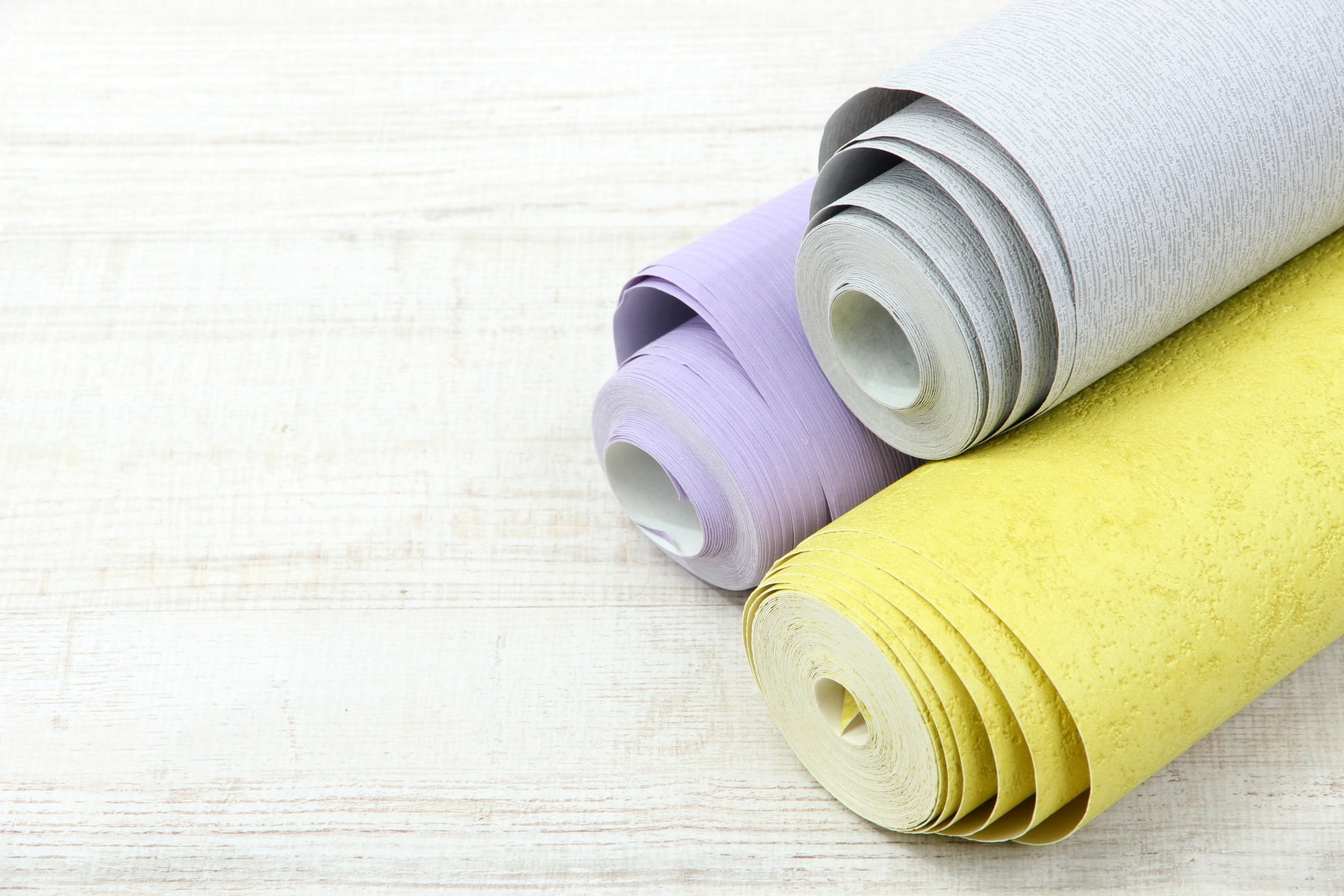 wallpaper rolls on floor